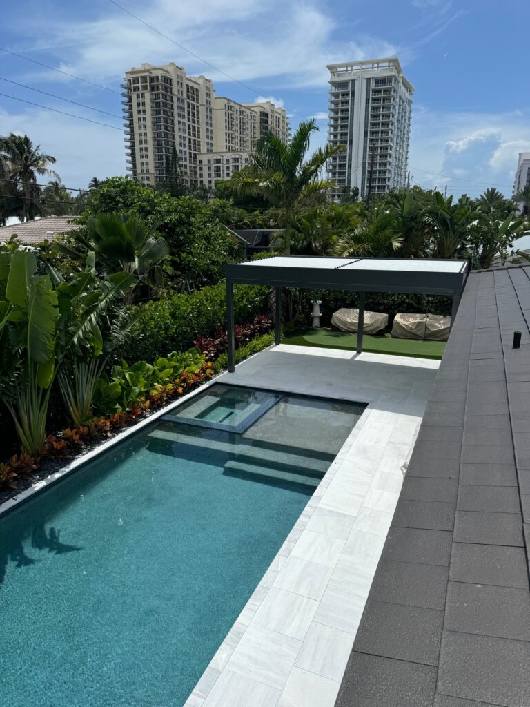 Poolside SkyShade pivoting louvered pergola roof