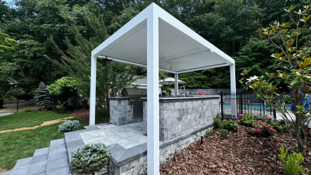 Backyard SkyShade pivoting louvered pergola roof